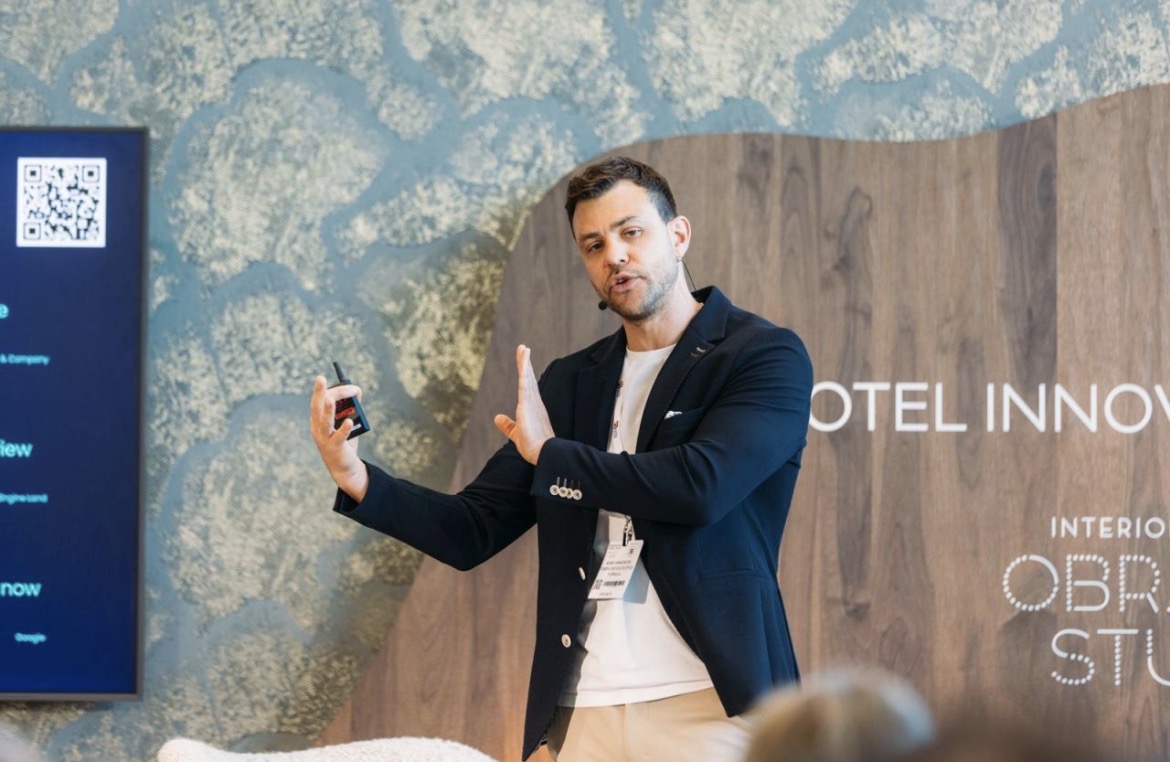 Adam Hamadache, founder of Formula, speaking at a hotel innovation event